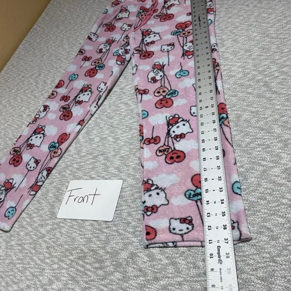 Sanrio Hello Kitty pink pajama pants with repeating Hello Kitty women M. SKU-C58